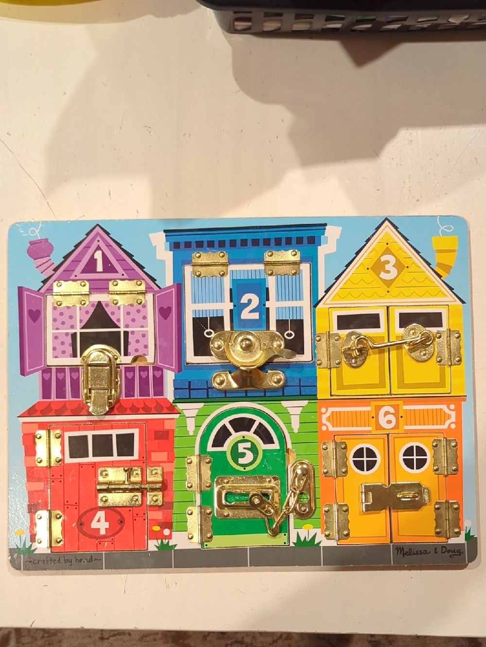 Melissa & Doug Wooden Busy Board with Colorful House Panels and Metal Locks - Picture 3 of 4